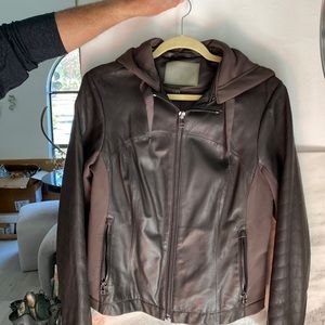 ATHLETA Brown leather and stretchy material bomber jacket.